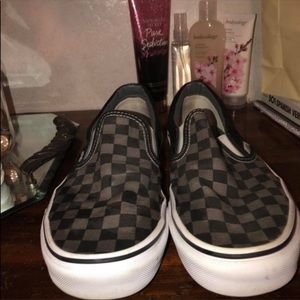 Checkerboard slip on vans